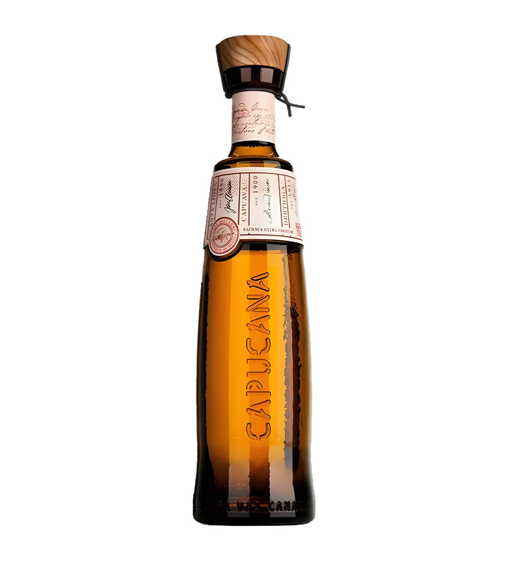 Capucana Cachaça Liqueur 70cl frosted glass bottle on white background, beige label with gold accents and brand logo