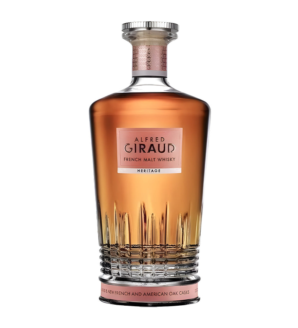 Alfred Giraud Heritage French Whisky 3x70cl bottles on white background, amber spirit with luxurious black and gold labels featuring brand logo