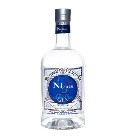 Amrut Nilgiris cask aged gin 70cl bottle on white background, amber glass with elegant blue label