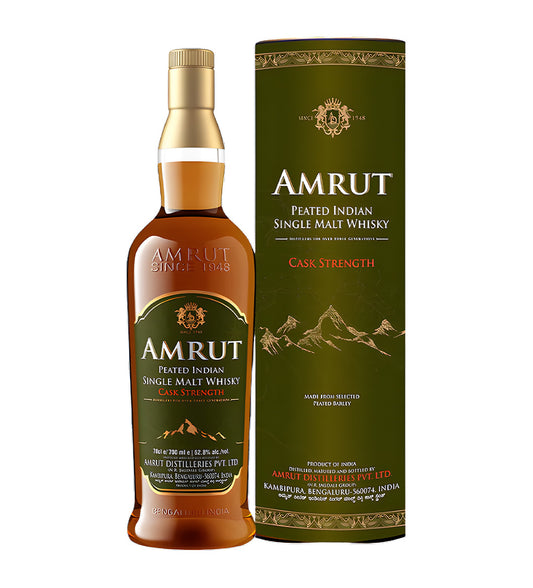 Amrut Peated Single Malt Cask Strength Whisky 70cl clear glass bottle on white background, deep amber spirit with dark blue and gold label highlighting peated style and high strength