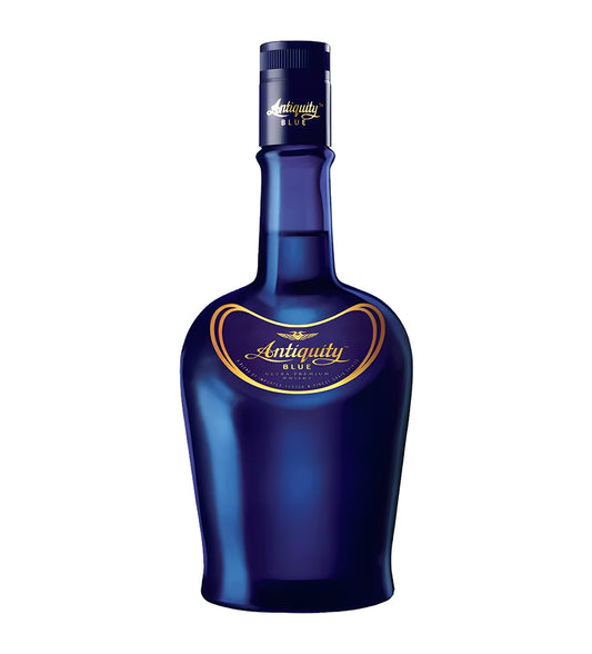 Antiquity Blue Premium Whisky 75cl clear glass bottle on white background, golden amber spirit with deep blue and gold label featuring brand crest