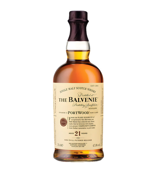 The Balvenie 21 Years Portwood Single Malt Scotch Whisky 70cl clear glass bottle on white background, rich amber spirit with cream and burgundy label featuring distillery crest and age statement