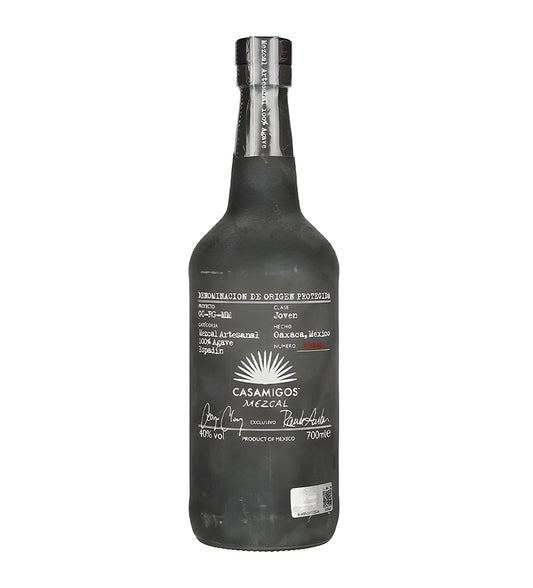 Casamigos Mezcal 70cl clear glass bottle on white background, light silver spirit with cream label featuring black text and agave illustration