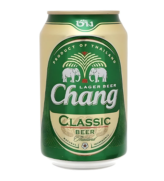 Chang Classic Thai lager beer 33cl can on white background, green and gold design with elephant logo