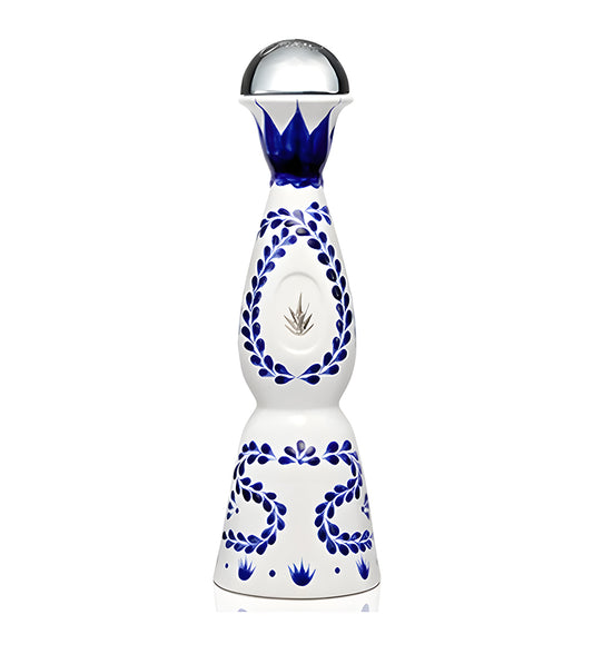 Clase Azul Reposado Tequila 70cl tall white ceramic bottle on white background, hand-painted blue designs with silver agave emblem