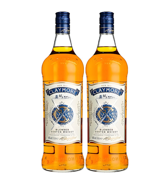 Claymore Blended Scotch Whisky Twin Pack 1L bottles on white background, golden amber spirit with cream and blue labels featuring crossed claymore swords
