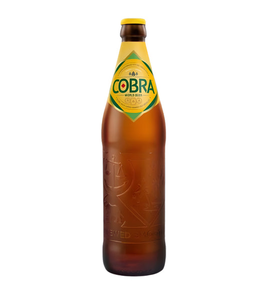 Brown Cobra beer bottle with a green label on a white background