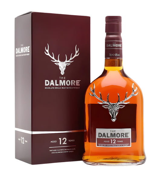 Dalmore 12 Years Old Highland Single Malt Scotch Whisky 70cl clear glass bottle on white background, rich amber spirit with black and silver label featuring stag emblem