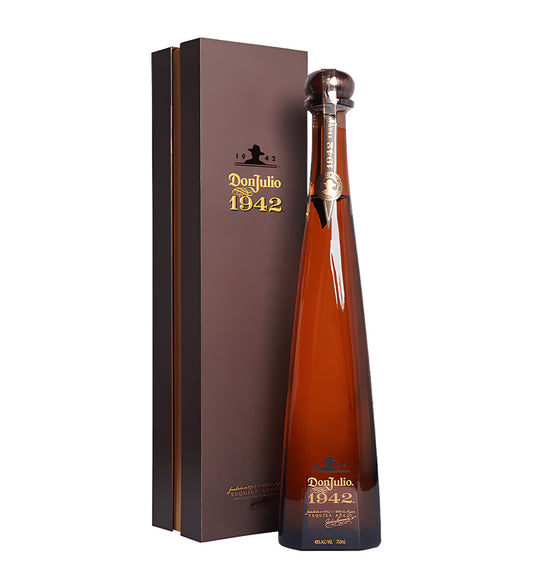 Don Julio 1942 premium añejo tequila 75cl tall amber glass bottle on white background, elegant gold label with embossed details