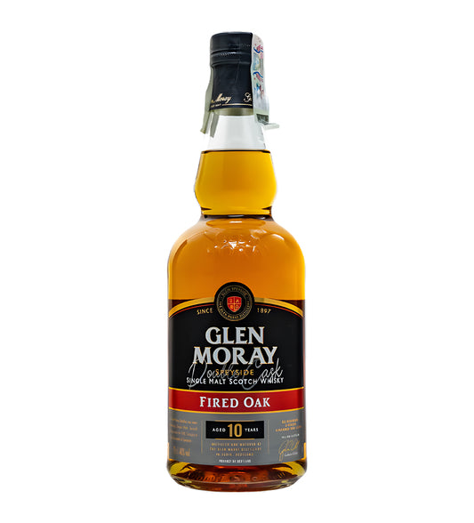 Glen Moray Fired Oak Speyside Single Malt Scotch Whisky 70cl clear glass bottle on white background, golden amber spirit with black and copper label highlighting fired oak finish