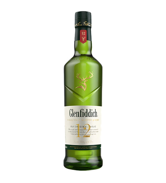 Glenfiddich 12 Years Special Reserve Single Malt Scotch Whisky 1L green glass bottle on white background, golden spirit with triangular shape and cream label featuring stag logo