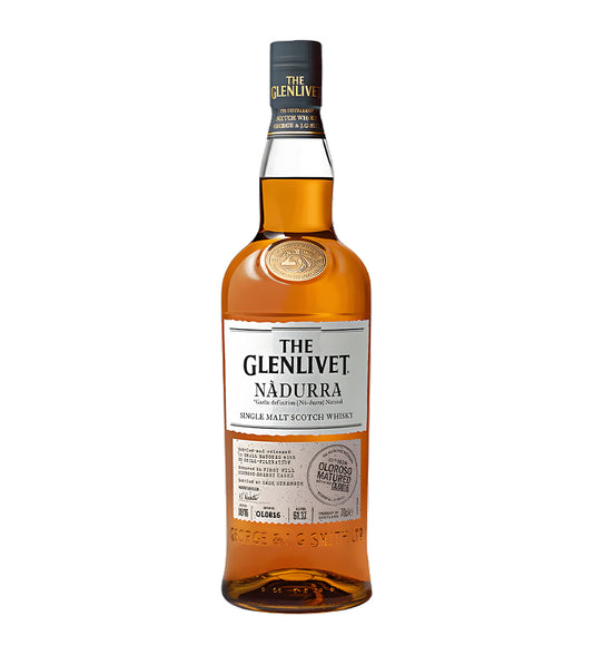 The Glenlivet Nadurra Peated Single Malt Scotch Whisky 1L clear glass bottle on white background, golden spirit with cream label featuring peated cask strength details