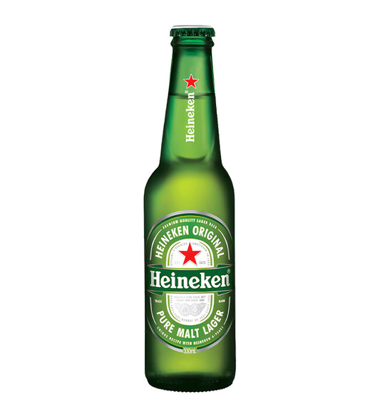 Green Heineken beer bottle on a white background
