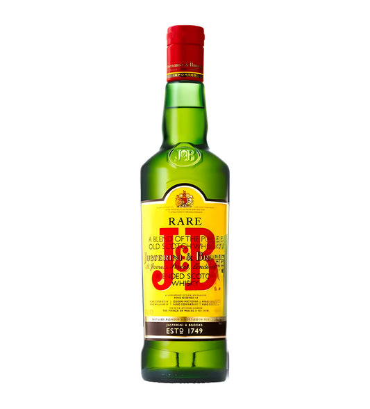 J & B Blended Scotch Whisky 1L clear glass bottle on white background, golden amber spirit with green and gold label featuring brand crest