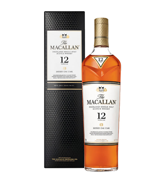 Tall clear glass bottle, rich amber whisky, traditional label with gold and red accents, white background, realistic lighting and reflections.