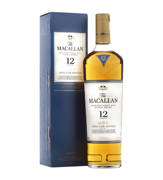 Clear glass bottle, amber whisky, label with triple cask details, white background, crisp studio lighting, subtle shadows.