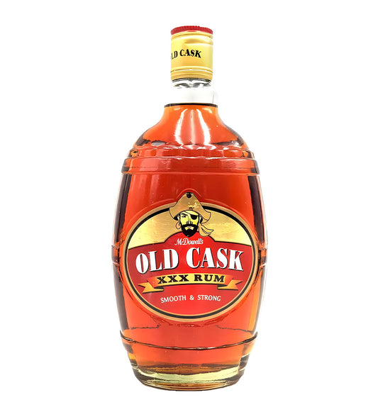 McDowell’s Old Cask XXX Rum 75cl dark glass bottle on white background, black and gold label with brand logo