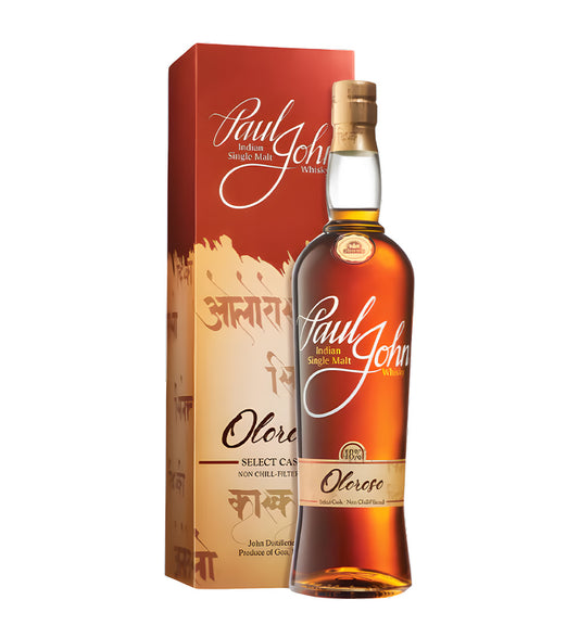 Sleek Indian single malt bottle, amber-gold whisky, Paul John label with modern design, white background, realistic reflections