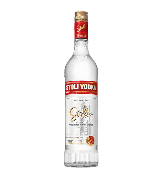 Stolichnaya Vodka 75cl clear glass bottle on white background, white and red label with gold accents and brand logo