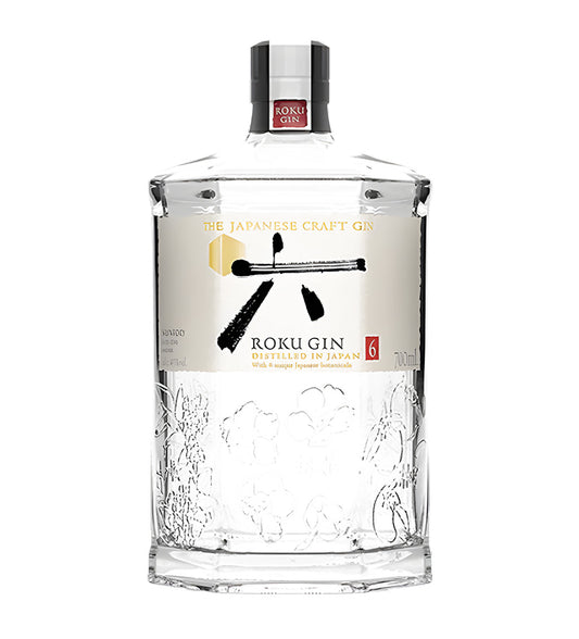 Suntory Roku Japanese Craft Gin 70cl clear hexagonal glass bottle on white background, white label with calligraphy and floral accents