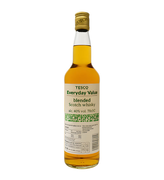 70cl blended whisky, amber liquid, Tesco Everyday branding, cinematic lighting emphasizing label clarity, reflections on glass, subtle shadows, neutral background.